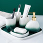 Washing suit couple brushing teeth and mouthwash cup